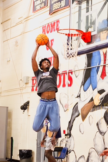 Snow Method athlete rising to finish at the rim during private training in Albany, Georgia